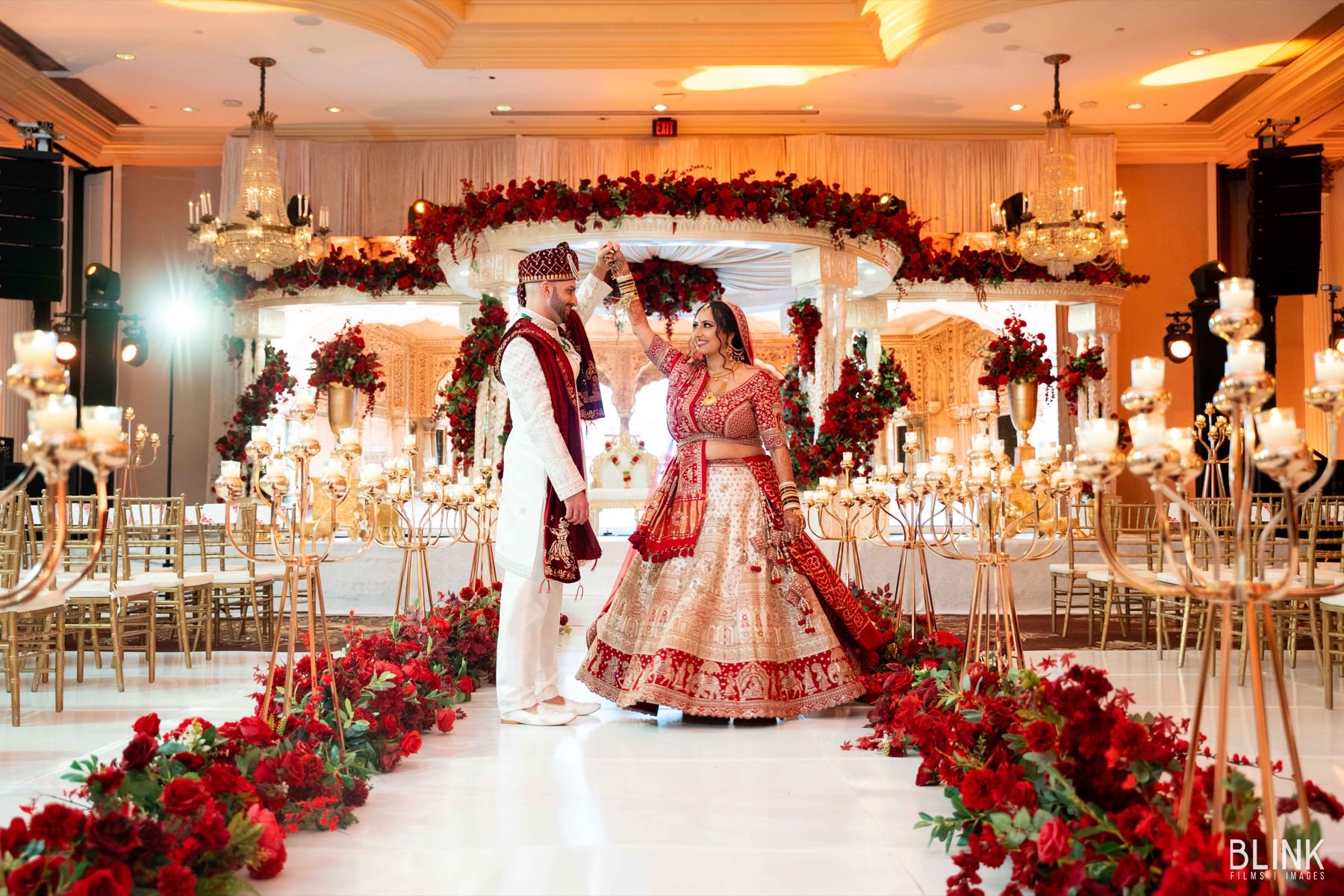 Traditional Hindu wedding ceremony with ornate mandap and floral decorations